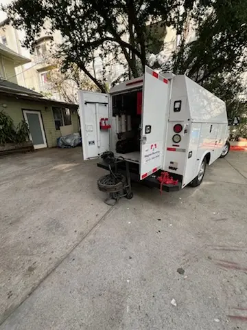Magnet Plumbing service vehicle on-site for Grease Trap Cleaning in Homestead
